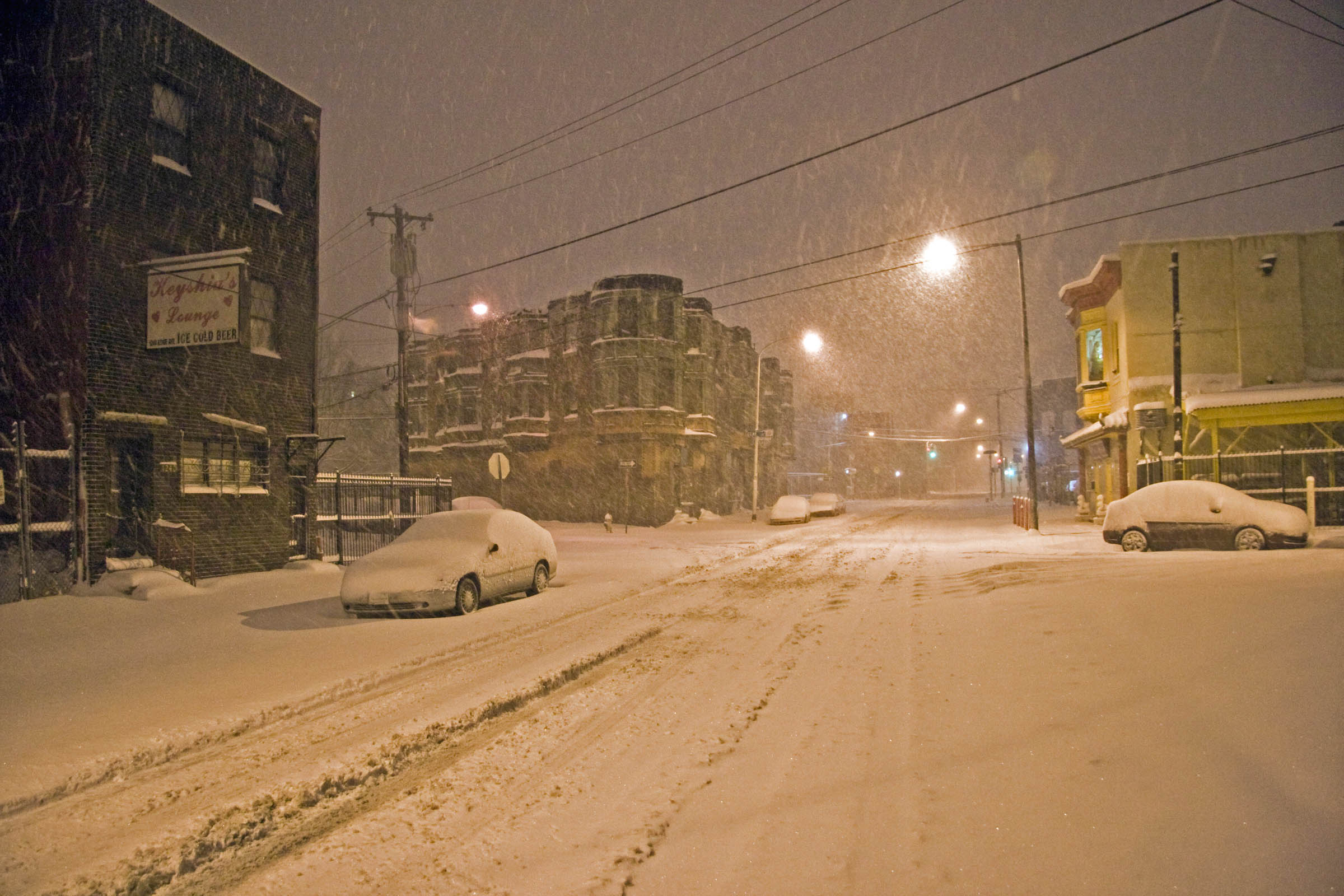 Night shot of snow falling on Ridge Avenue, Philadelphia, PA, 2010.