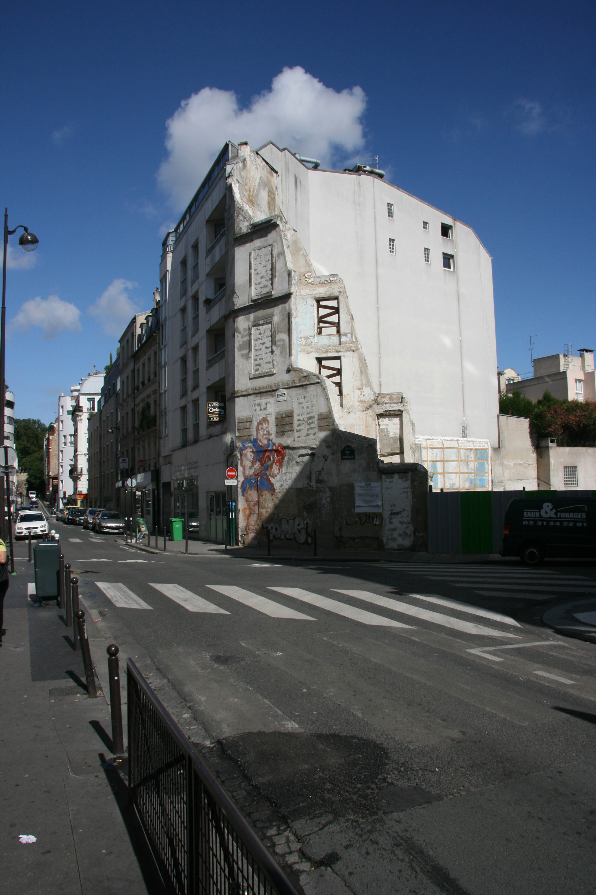 Street scene with mural, Paris, France, 2010.